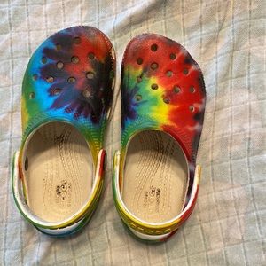 Used tie-dye crocs.  Toddler size 11